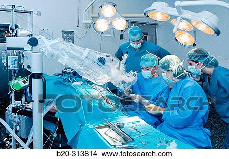 Surgeons during hearing operation at otorhinolaryngology operating room of hospital View Large Photo Image Picture - Surgeons during hearing operation at otorhinolaryngology operating room of hospital. Fotosearch
