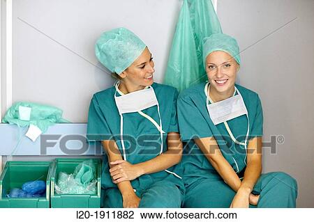 Stock Image - surgeons in the operating room locker, Onkologikoa Hospital, Oncology Institute, Case Center for prevention, diagnosis and treatment of cancer, Donostia, San Sebastian, Gipuzkoa, Basque Country, Spain. Fotosearch