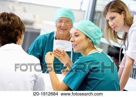 Picture - Surgeons, medical meeting, clinical session, Onkologikoa Hospital, Oncology Institute, Case Center for prevention, diagnosis and treatment of cancer, Donostia, San Sebastian, Gipuzkoa, Basque Country, Spain. Fotosearch