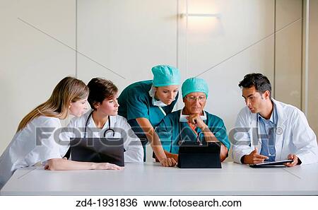 Surgeons, medical meeting, clinical session, Onkologikoa Hospital, Oncology Institute, Case Center for prevention, diagnosis and treatment of cancer, Donostia, San Sebastian, Gipuzkoa, Basque Country, Spain View Large Photo Image Stock Photograph - Surgeons, medical meeting, clinical session, Onkologikoa Hospital, Oncology Institute, Case Center for prevention, diagnosis and treatment of cancer, Donostia, San Sebastian, Gipuzkoa, Basque Country, Spain. Fotosearch