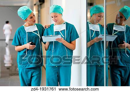 Surgeons with tablet in the operating room hallway, Onkologikoa Hospital, Oncology Institute, Case Center for prevention, diagnosis and treatment of cancer, Donostia, San Sebastian, Gipuzkoa, Basque Country, Spain View Large Photo Image Stock Image - Surgeons with tablet in the operating room hallway, Onkologikoa Hospital, Oncology Institute, Case Center for prevention, diagnosis and treatment of cancer, Donostia, San Sebastian, Gipuzkoa, Basque Country, Spain. Fotosearch