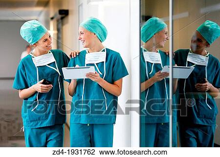 Surgeons with tablet in the operating room hallway, Onkologikoa Hospital, Oncology Institute, Case Center for prevention, diagnosis and treatment of cancer, Donostia, San Sebastian, Gipuzkoa, Basque Country, Spain View Large Photo Image Stock Image - Surgeons with tablet in the operating room hallway, Onkologikoa Hospital, Oncology Institute, Case Center for prevention, diagnosis and treatment of cancer, Donostia, San Sebastian, Gipuzkoa, Basque Country, Spain. Fotosearch