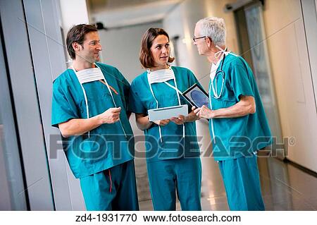 Surgeons with tablet in the operating room hallway, Onkologikoa Hospital, Oncology Institute, Case Center for prevention, diagnosis and treatment of cancer, Donostia, San Sebastian, Gipuzkoa, Basque Country, Spain View Large Photo Image Stock Image - Surgeons with tablet in the operating room hallway, Onkologikoa Hospital, Oncology Institute, Case Center for prevention, diagnosis and treatment of cancer, Donostia, San Sebastian, Gipuzkoa, Basque Country, Spain. Fotosearch