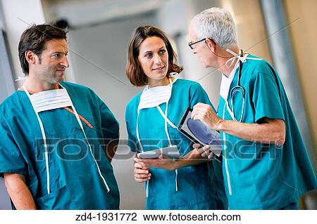 Surgeons with tablet in the operating room hallway, Onkologikoa Hospital, Oncology Institute, Case Center for prevention, diagnosis and treatment of cancer, Donostia, San Sebastian, Gipuzkoa, Basque Country, Spain View Large Photo Image Stock Image - Surgeons with tablet in the operating room hallway, Onkologikoa Hospital, Oncology Institute, Case Center for prevention, diagnosis and treatment of cancer, Donostia, San Sebastian, Gipuzkoa, Basque Country, Spain. Fotosearch