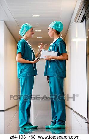 Surgeons with tablet in the operating room hallway, Onkologikoa Hospital, Oncology Institute, Case Center for prevention, diagnosis and treatment of cancer, Donostia, San Sebastian, Gipuzkoa, Basque Country, Spain View Large Photo Image Stock Photo - Surgeons with tablet in the operating room hallway, Onkologikoa Hospital, Oncology Institute, Case Center for prevention, diagnosis and treatment of cancer, Donostia, San Sebastian, Gipuzkoa, Basque Country, Spain. Fotosearch