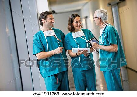 Surgeons with tablet in the operating room hallway, Onkologikoa Hospital, Oncology Institute, Case Center for prevention, diagnosis and treatment of cancer, Donostia, San Sebastian, Gipuzkoa, Basque Country, Spain View Large Photo Image Stock Photo - Surgeons with tablet in the operating room hallway, Onkologikoa Hospital, Oncology Institute, Case Center for prevention, diagnosis and treatment of cancer, Donostia, San Sebastian, Gipuzkoa, Basque Country, Spain. Fotosearch