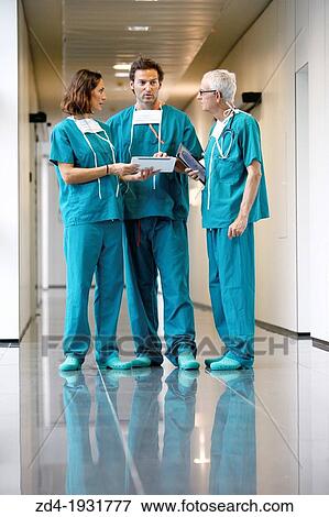 Surgeons with tablet in the operating room hallway, Onkologikoa Hospital, Oncology Institute, Case Center for prevention, diagnosis and treatment of cancer, Donostia, San Sebastian, Gipuzkoa, Basque Country, Spain View Large Photo Image Stock Photo - Surgeons with tablet in the operating room hallway, Onkologikoa Hospital, Oncology Institute, Case Center for prevention, diagnosis and treatment of cancer, Donostia, San Sebastian, Gipuzkoa, Basque Country, Spain. Fotosearch