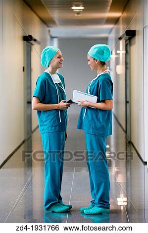 Surgeons with tablet in the operating room hallway, Onkologikoa Hospital, Oncology Institute, Case Center for prevention, diagnosis and treatment of cancer, Donostia, San Sebastian, Gipuzkoa, Basque Country, Spain View Large Photo Image Stock Photograph - Surgeons with tablet in the operating room hallway, Onkologikoa Hospital, Oncology Institute, Case Center for prevention, diagnosis and treatment of cancer, Donostia, San Sebastian, Gipuzkoa, Basque Country, Spain. Fotosearch