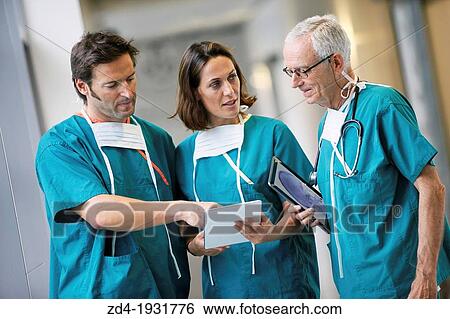 Surgeons with tablet in the operating room hallway, Onkologikoa Hospital, Oncology Institute, Case Center for prevention, diagnosis and treatment of cancer, Donostia, San Sebastian, Gipuzkoa, Basque Country, Spain View Large Photo Image Stock Photograph - Surgeons with tablet in the operating room hallway, Onkologikoa Hospital, Oncology Institute, Case Center for prevention, diagnosis and treatment of cancer, Donostia, San Sebastian, Gipuzkoa, Basque Country, Spain. Fotosearch