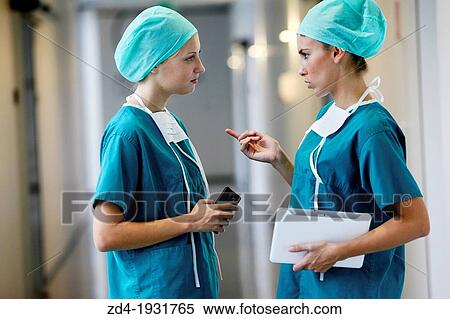 Surgeons with tablet in the operating room hallway, Onkologikoa Hospital, Oncology Institute, Case Center for prevention, diagnosis and treatment of cancer, Donostia, San Sebastian, Gipuzkoa, Basque Country, Spain View Large Photo Image Stock Photography - Surgeons with tablet in the operating room hallway, Onkologikoa Hospital, Oncology Institute, Case Center for prevention, diagnosis and treatment of cancer, Donostia, San Sebastian, Gipuzkoa, Basque Country, Spain. Fotosearch