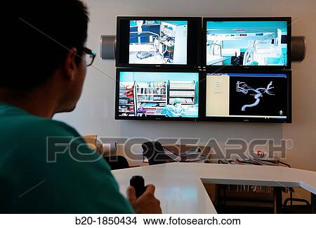Surgery preparation screens, Interventional Neuroradiology, Radiology Department, Donostia Hospital, San Sebastian, Donostia, Gipuzkoa, Basque Country, Spain View Large Photo Image Picture - Surgery preparation screens, Interventional Neuroradiology, Radiology Department, Donostia Hospital, San Sebastian, Donostia, Gipuzkoa, Basque Country, Spain. Fotosearch
