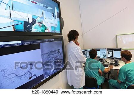Stock Image - Surgery preparation screens, Interventional Neuroradiology, Radiology Department, Donostia Hospital, San Sebastian, Donostia, Gipuzkoa, Basque Country, Spain. Fotosearch