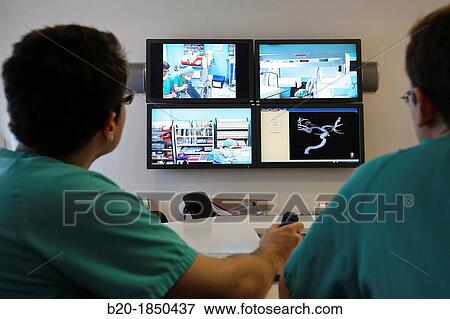 Stock Photo - Surgery preparation screens, Interventional Neuroradiology, Radiology Department, Donostia Hospital, San Sebastian, Donostia, Gipuzkoa, Basque Country, Spain. Fotosearch
