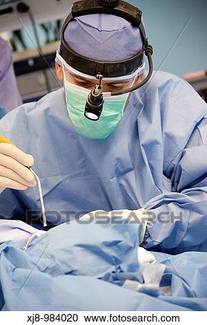 Stock Image - Surgical removal of the adenoids, otorhinolaryngology operating room. Hospital Policlinica Gipuzkoa, San Sebastian, Donostia, Euskadi, Spain. Fotosearch
