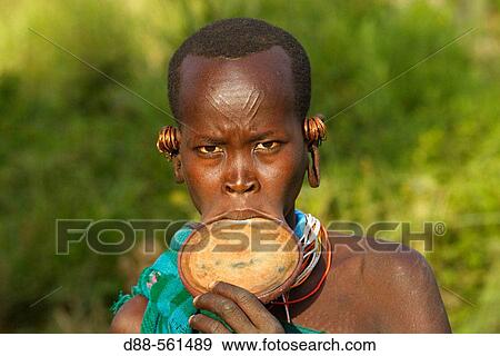 Surma girl. Near Kibish. Ethiopia. View Large Photo Image Stock Photo - Surma girl. Near Kibish. Ethiopia.. Fotosearch