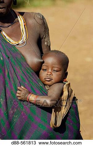 Surma woman and baby. Near Kibish. Ethiopia. View Large Photo Image Stock Image - Surma woman and baby. Near Kibish. Ethiopia.. Fotosearch
