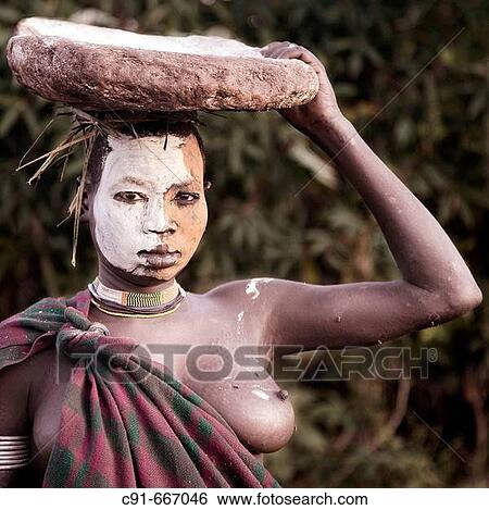 Surma woman. South Ethiopia View Large Photo Image Stock Photograph - Surma woman. South Ethiopia. Fotosearch