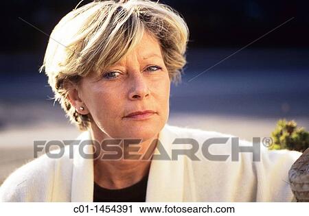 Suspicious looking mature woman portrait View Large Photo Image Stock Image - Suspicious looking mature woman portrait. Fotosearch
