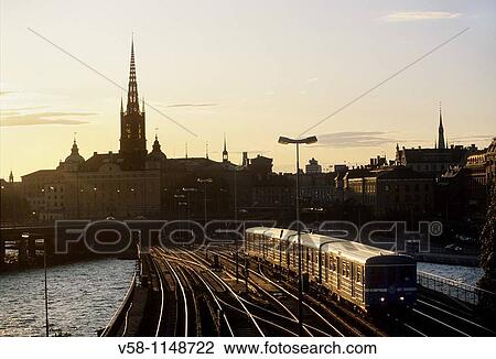 Stock Image - Sweden, Stockholm, Gamla Stan Old town, Central bridge and Riddarholmen Island. Fotosearch