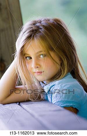 Stock Image - Sweet 6-year old girl portrait. Fotosearch