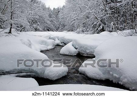 Swift River during the winter months This river runs along the side of the Kancamagus Highway route 112 which is one of New England's scenic byways Located in the White Mountains, New Hampshire USA View Large Photo Image Picture - Swift River during the winter months This river runs along the side of the Kancamagus Highway route 112 which is one of New England's scenic byways Located in the White Mountains, New Hampshire USA. Fotosearch