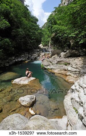 swimming in Loup River gorges, Alpes-Maritimes department, Provence-Alpes-Cote d? Azur region, southeast of France, Europe. View Large Photo Image Stock Photo - swimming in Loup River gorges, Alpes-Maritimes department, Provence-Alpes-Cote d? Azur region, southeast of France, Europe.. Fotosearch