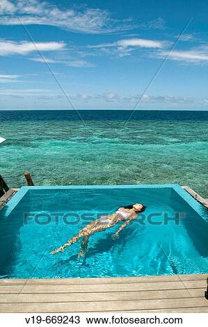 Swimming pool in Paradise, Maldives View Large Photo Image Stock Image - Swimming pool in Paradise, Maldives. Fotosearch