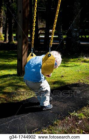 Swing, a Moment's Rest View Large Photo Image Stock Image - Swing, a Moment's Rest. Fotosearch
