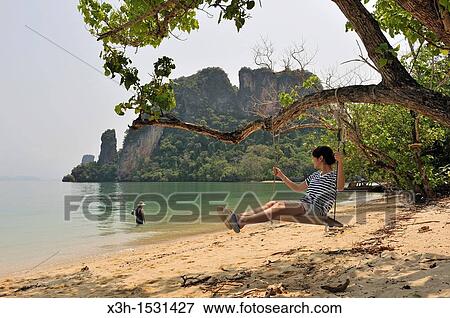 Swing on a Koh Pak Bea beach, Krabi, Thailand, Asia View Large Photo Image Stock Photo - Swing on a Koh Pak Bea beach, Krabi, Thailand, Asia. Fotosearch