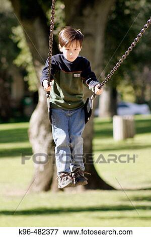 swinging child View Large Photo Image Stock Photo - swinging child. Fotosearch