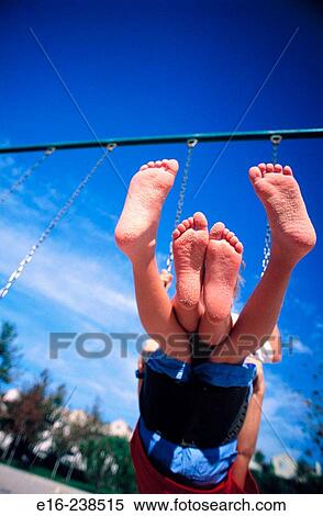 swinging feet View Large Photo Image Stock Photography - swinging feet. Fotosearch