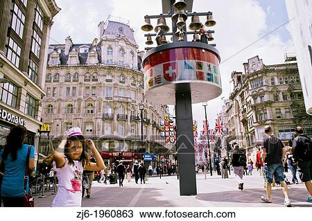 Swiss Glockenspiel clock at Leicester Square, London, England, UK. View Large Photo Image Stock Image - Swiss Glockenspiel clock at Leicester Square, London, England, UK.. Fotosearch