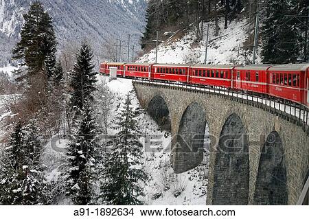 Switzerland, The Graubunden canton, the glacier express train, mountain rack train from Saint-Moritz to Zermatt View Large Photo Image Picture - Switzerland, The Graubunden canton, the glacier express train, mountain rack train from Saint-Moritz to Zermatt. Fotosearch