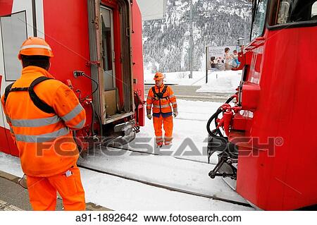 Switzerland, The Graubunden canton, the glacier express train, mountain rack train from Saint-Moritz to Zermatt, the special rack railway engine in Desantis station View Large Photo Image Stock Image - Switzerland, The Graubunden canton, the glacier express train, mountain rack train from Saint-Moritz to Zermatt, the special rack railway engine in Desantis station. Fotosearch