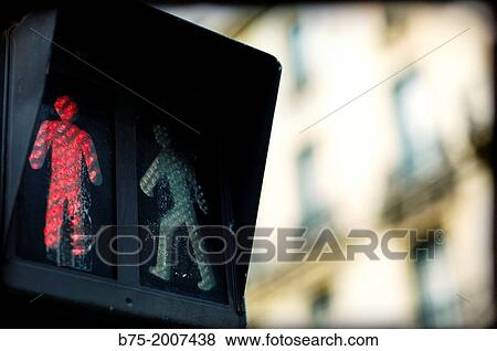 Symbol of a pedestrian crossing traffic light in the center of Paris, France, Europe View Large Photo Image Stock Photo - Symbol of a pedestrian crossing traffic light in the center of Paris, France, Europe. Fotosearch