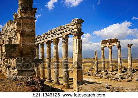 Stock Photography - Syria, Apamea, columns of the citadel. Back, Qa? allat Al-Medik. Fotosearch