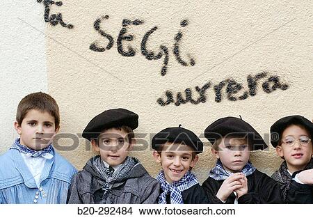 Ta segi aurrera (? and goes on? in Basque language) sign with children in typical costumes during? Olentzero? typical Christmas festival. Legazpi, Guipzcoa. Euskadi, Spain View Large Photo Image Picture - Ta segi aurrera (? and goes on? in Basque language) sign with children in typical costumes during? Olentzero? typical Christmas festival. Legazpi, Guipzcoa. Euskadi, Spain. Fotosearch
