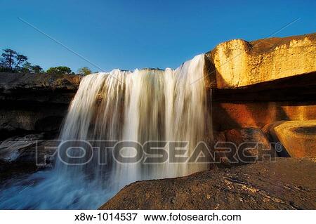 Tad Leuk is a waterfall within the Nam Leuk, one of the three major rivers of the reserve (Tad means waterfall, while Nam means river). View Large Photo Image Stock Photo - Tad Leuk is a waterfall within the Nam Leuk, one of the three major rivers of the reserve (Tad means waterfall, while Nam means river).. Fotosearch