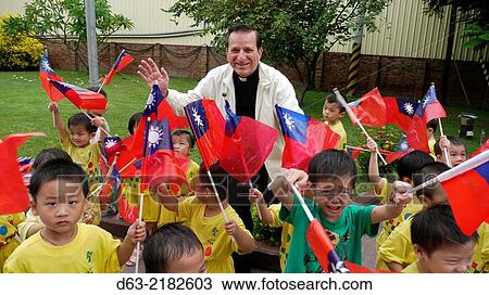 TAIWAN. Sacred Heart of Jesus and Mary, Yuanli. Project of an AMERICAN MISSIONARY PRIEST, children's day care center. Greeting the visitors.. View Large Photo Image Stock Image - TAIWAN. Sacred Heart of Jesus and Mary, Yuanli. Project of an AMERICAN MISSIONARY PRIEST, children's day care center. Greeting the visitors... Fotosearch
