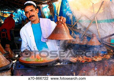 Tajinne of pots for traditional vegetables - meat pot. Morocco View Large Photo Image Stock Image - Tajinne of pots for traditional vegetables - meat pot. Morocco. Fotosearch