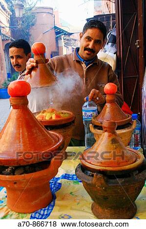 Tajinne of pots for traditional vegetables - meat pot. Morocco View Large Photo Image Stock Photo - Tajinne of pots for traditional vegetables - meat pot. Morocco. Fotosearch