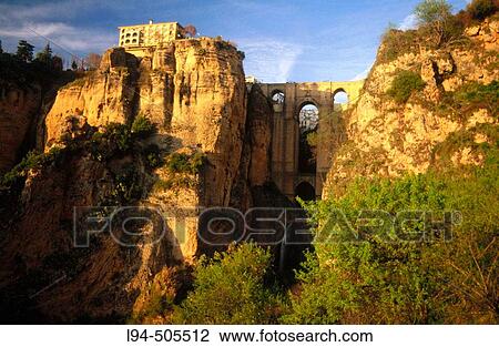 ? Tajo? gorge and Puente Nuevo (new bridge), Ronda. MBlaga province, Andalusia, Spain View Large Photo Image Stock Image - ? Tajo? gorge and Puente Nuevo (new bridge), Ronda. MBlaga province, Andalusia, Spain. Fotosearch