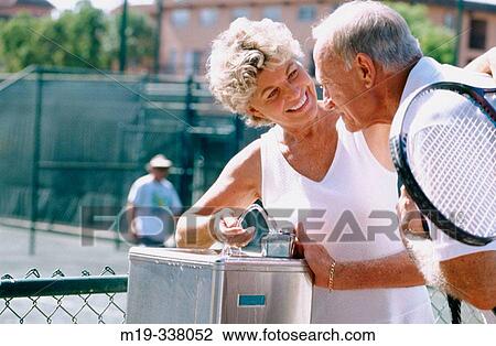 taking a break from tennis View Large Photo Image Stock Image - taking a break from tennis. Fotosearch