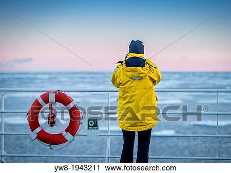 Taking a picture from the deck of the Akademik Sergey Vavilov -Russian ice breaker used as a cruise ship, Greenland. View Large Photo Image Stock Image - Taking a picture from the deck of the Akademik Sergey Vavilov -Russian ice breaker used as a cruise ship, Greenland.. Fotosearch