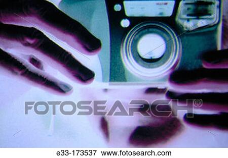 Taking a picture View Large Photo Image Stock Photo - Taking a picture. Fotosearch