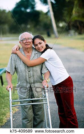 Taking a walk with grandpa View Large Photo Image Stock Photo - Taking a walk with grandpa. Fotosearch
