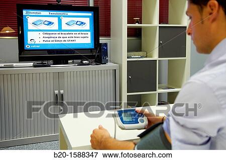 Taking blood pressure, Taking vital signs View Large Photo Image Stock Photo - Taking blood pressure, Taking vital signs. Fotosearch