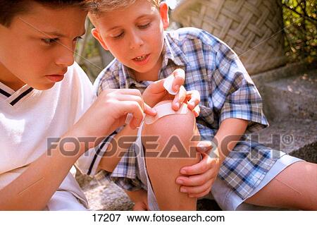 Taking care of brother View Large Photo Image Stock Photo - Taking care of brother. Fotosearch
