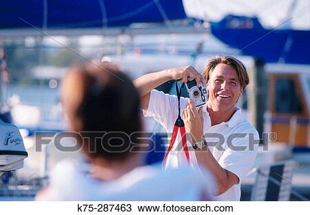 taking pictures at the marina View Large Photo Image Stock Image - taking pictures at the marina. Fotosearch