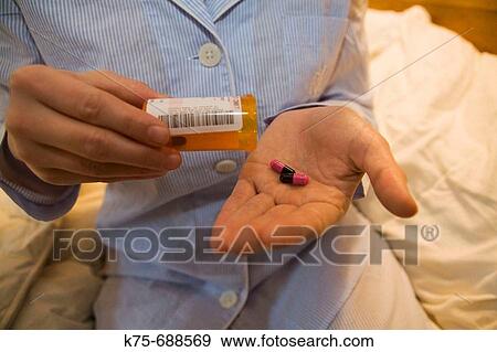 taking prescription medicine View Large Photo Image Stock Photo - taking prescription medicine. Fotosearch